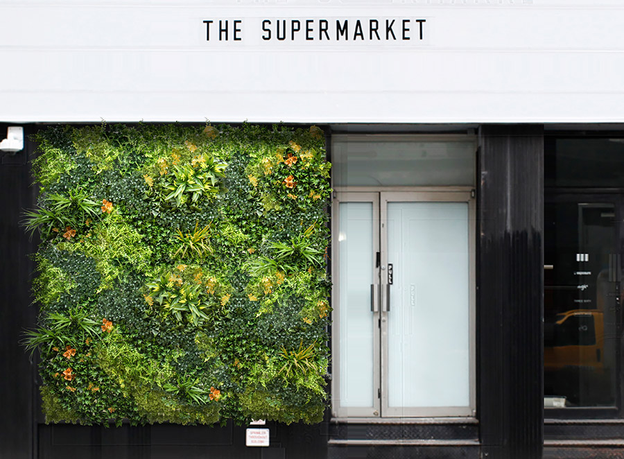 The Pros of Fake Plant Walls for Business Areas 2 fake greenery wall